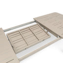 Beige outdoor table with a folding leaf on a white background