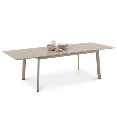 Beige outdoor dining table with minimal decor on a white background