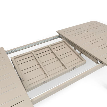 Beige outdoor table with a folding leaf on a white background