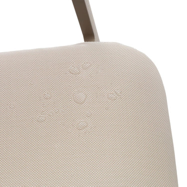 Close-up of a beige upholstered chair seat with a white background